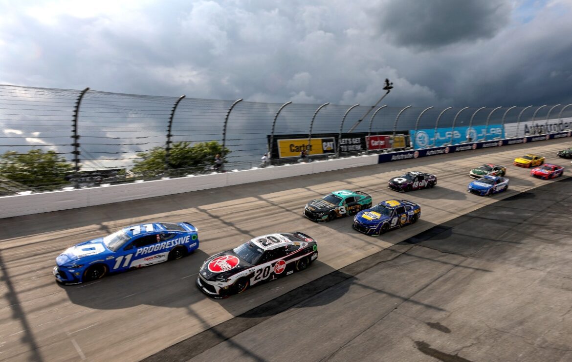 GettyImages-2226197461.jpg Hamlin holds off Bell to achieve a Dover trifecta in overtime.