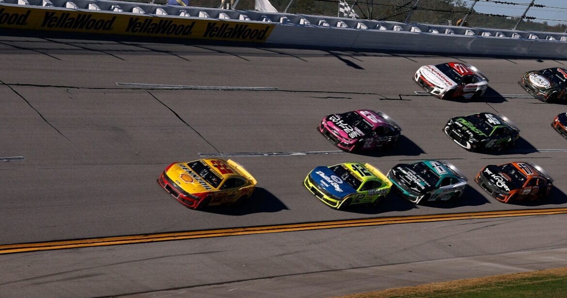 GettyImages-2242075048.jpg Logano and Blaney express frustration over the 'weak' bottom lane as they approach the Talladega finish.