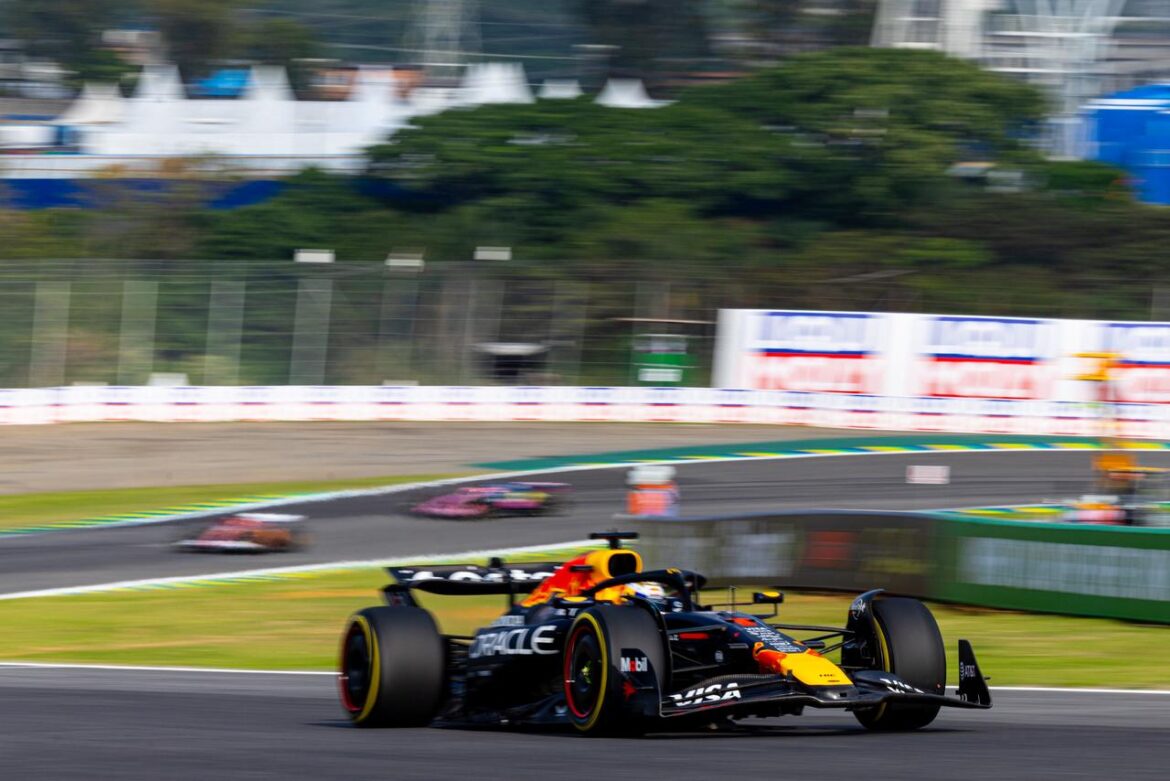 Verstappen exits the pit lane following a penalty for Red Bull making modifications to the car.